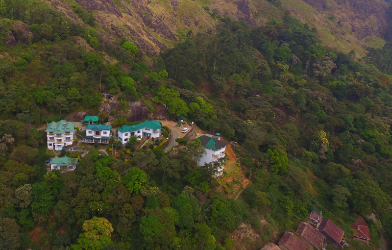 Deshadan Mountain Resort Munnar honeymoon room balcony view 2026