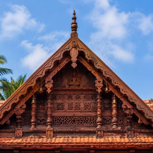 Majestic golden gopuram architecture of Sree Padmanabhaswamy Temple for Malai Nadu Divya Desam pilgrimage.
